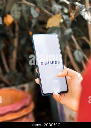 Assam, india - Augest 9, 2020 : Samsung logo on a phone screen stock image. Stock Photo