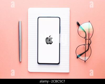 Assam, india - Augest 9, 2020 : Apple logo on phone screen stock image. Stock Photo