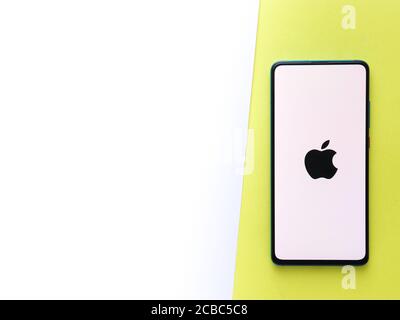 Assam, india - Augest 9, 2020 : Apple logo on phone screen stock image. Stock Photo