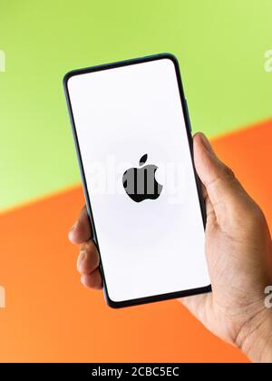 Assam, india - Augest 9, 2020 : Apple logo on phone screen stock image. Stock Photo