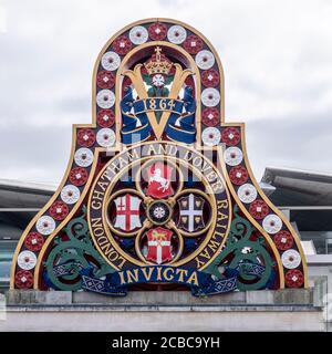 Restored crest and insignia for the London Chatham and Dover Railway on the original Blackfriars Railway bridge over the Thames at the South Bank Stock Photo
