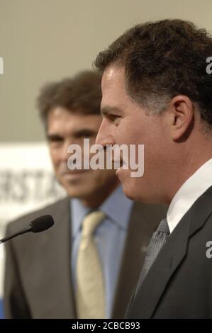 Austin, Texas USA, September 25, 2006: Michael Dell, founder of Dell Computers, announces at a press conference with Texas Gov. Rick Perry (left) at the Texas Capitol that Dell is planning to immediately expand its central Texas engineering staff by 500 engineers in product development. ©Bob Daemmrich Stock Photo