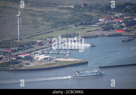 Norden, Germany. 07th Aug, 2020. Ships lie in the port of Borkum. Credit: Sina Schuldt/dpa/Alamy Live News Stock Photo