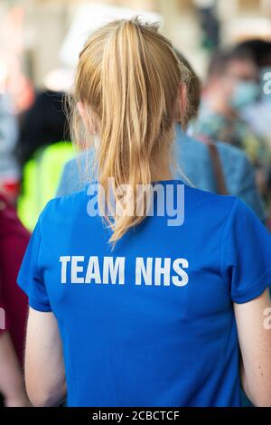 NHS workers march in protest from St. Thomas' Hospital to Downing Street, Central London, demanding a pay rise from Boris Johnson's Government. Stock Photo