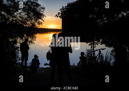 Poznan, Wielkopolska, Poland. 12th Aug, 2020. Watching and photographing the sunset in Poznan. Another hot summer day has just passed. Credit: Dawid Tatarkiewicz/ZUMA Wire/Alamy Live News Stock Photo