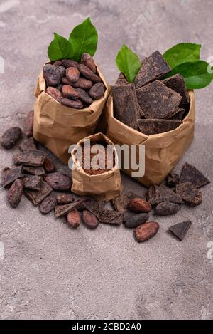 Natural cocoa powder, cocoa beans and chocolate Stock Photo