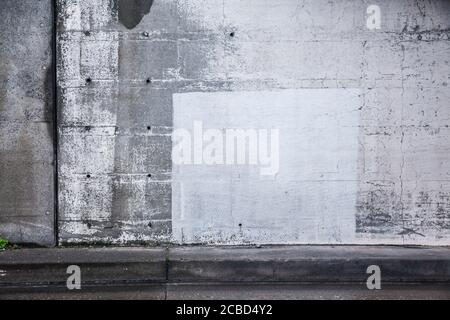 A section of a concrete wall inside an underground roadway tunnle. Stock Photo