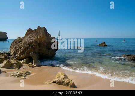 Beach rock in Praia da Oura, Algarve Portugal beach at summer season Stock Photo