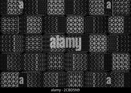 Shiny black square and holes penetrating from each side floating in the dark. The pattern of many black square shapes. The concepts of abstract backgr Stock Photo