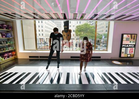 Toy store with sales piano on floor