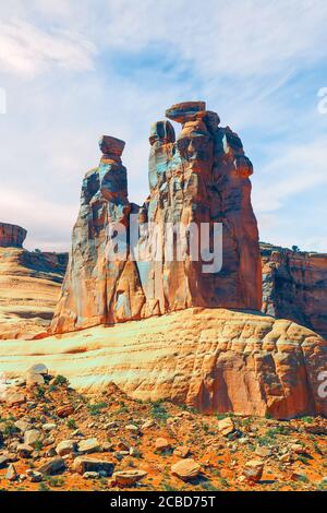 The rock formation known as the Three Gossips in the Courthouse Towers section. Arches National Park. Moab. Utah. USA Stock Photo