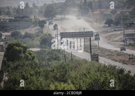 Idlib, Syria. 12th Aug, 2020. The Russian Military and the Turkish military conducted their 24th joint patrol on the M4 highway in the northwestern Syria region of Greater Idlib, on August 12, 2020. The joint patrol set off from the town of Tronba in southern Idlib and reached the town of Ain Hawr in northern Lattakia, completing its entire route. No incidents whatsoever were reported during the patrol. (Photo by Azalden Idlib/INA Photo Agency/Sipa USA) Credit: Sipa USA/Alamy Live News Stock Photo