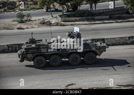 Idlib, Syria. 12th Aug, 2020. The Russian Military and the Turkish military conducted their 24th joint patrol on the M4 highway in the northwestern Syria region of Greater Idlib, on August 12, 2020. The joint patrol set off from the town of Tronba in southern Idlib and reached the town of Ain Hawr in northern Lattakia, completing its entire route. No incidents whatsoever were reported during the patrol. (Photo by Azalden Idlib/INA Photo Agency/Sipa USA) Credit: Sipa USA/Alamy Live News Stock Photo