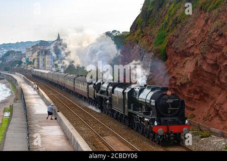 Devonian Express double headed by steam locomotives 46100 Royal Scot & 70000 Britannia passes Dawlish Devon UK. Stock Photo