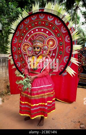 Theyyan designs in kerala temple festival procession Stock Photo