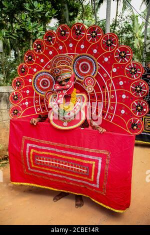 Theyyan designs in kerala temple festival procession Stock Photo