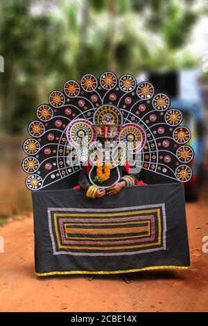 Theyyan designs in kerala temple festival procession Stock Photo