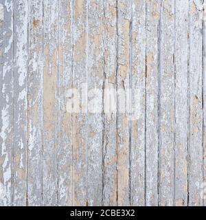 old white cracked paint on vertical wooden planks Stock Photo