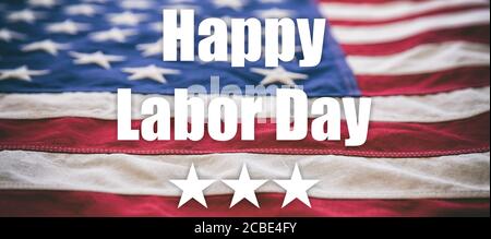 Happy Labor Day concept. National american holiday, text on USA flag background. Festive poster, banner Stock Photo