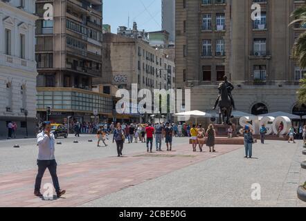 Unidentified people walk on Plaza de Armas square in the center of Santiago, Chile Stock Photo