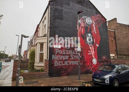 liverpool fc player jordan henderson with premier league trophy wall mural sybil road near anfield liverpool england uk Stock Photo