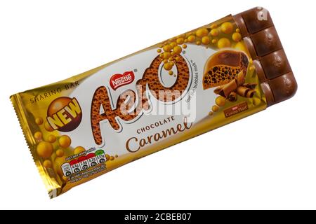 bar of new Nestle Aero chocolate caramel bar of chocolate opened to show contents isolated on white background - feel the bubbles melt Stock Photo