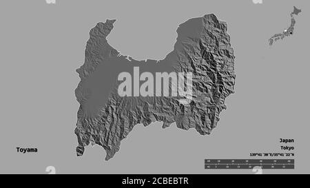 Shape of Toyama, prefecture of Japan, with its capital isolated on solid background. Distance scale, region preview and labels. Bilevel elevation map. Stock Photo