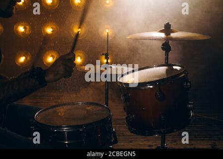 playing the drums. drum kit. set of drums. rock music genre.performance. the power of music Stock Photo