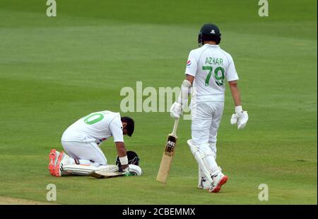Pakistan's Abid Ali reacts after being hit by a ball as he bats during day one of the Second Test match at the Ageas Bowl, Southampton. Stock Photo