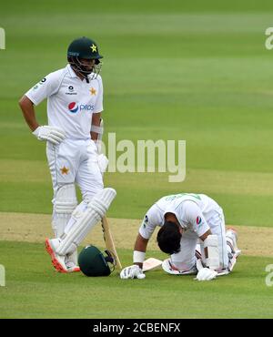 Pakistan's Abid Ali reacts after being hit by a ball as he bats during day one of the Second Test match at the Ageas Bowl, Southampton. Stock Photo