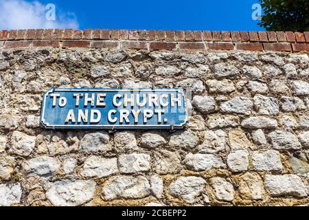 A sign on the path to the Church and Crypt of St Leonard's, Hythe, Kent, England Stock Photo