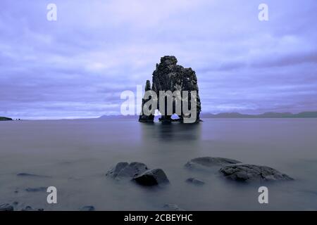 Gorgeous view of the Hvitserkur basalt stack located in Iceland in a gloomy weather Stock Photo