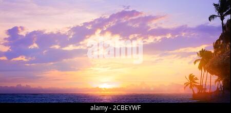 Art beautiful sunrise over the sea on the beach of a tropical island Stock Photo