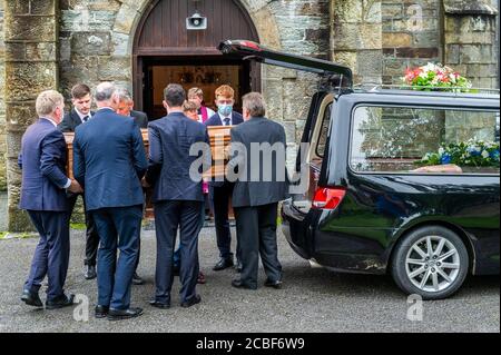 Goleen, West Cork, Ireland. 13th Aug, 2020. Ex Fine Gael TD Paddy Sheehan's  funeral took place at Church of our Lady, Star of the Sea and St. Patrick's in Goleen, West Cork today.   The coffin is lifted out of the hearse. Credit: AG News/Alamy Live News Stock Photo