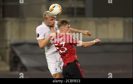 Victor Nelsson, KOP versus Brandon Williams Sport: Soccer: EL, Europa League, season 19/20, quarter finals, 10.08.2020 Manchester United - FC Copenhagen Photo: Jvºrgen Fromme/firosportphoto/POOL. | usage worldwide Stock Photo