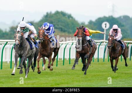 Ryan Tate riding Alpinista (left) wins The British Stallion Studs EBF Upavon Fillies' Stakes at Salisbury Racecourse on August 13, 2020 in Salisbury, England. Owners are allowed to attend if they have a runner at the meeting otherwise racing remains behind closed doors to the public due to the Coronavirus pandemic. (Photo by Alan Crowhurst/Getty Images) at Salisbury Racecourse, Wiltshire. Stock Photo