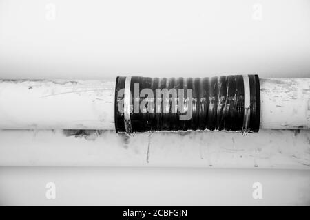PVC rubber pipe join connector installed repair fixed clogged pipeline in the building water sewage Stock Photo