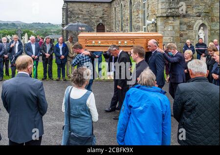 Goleen, West Cork, Ireland. 13th Aug, 2020. Ex Fine Gael TD Paddy Sheehan's  funeral took place at Church of our Lady, Star of the Sea and St. Patrick's in Goleen, West Cork today.   Paddy Sheehan is carried to his final resting place. Credit: AG News/Alamy Live News Stock Photo