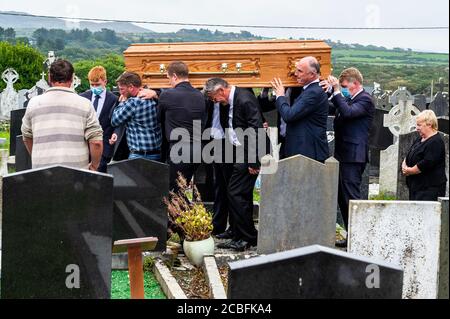 Goleen, West Cork, Ireland. 13th Aug, 2020. Ex Fine Gael TD Paddy Sheehan's  funeral took place at Church of our Lady, Star of the Sea and St. Patrick's in Goleen, West Cork today.   Paddy Sheehan is carried to his final resting place. Credit: AG News/Alamy Live News Stock Photo