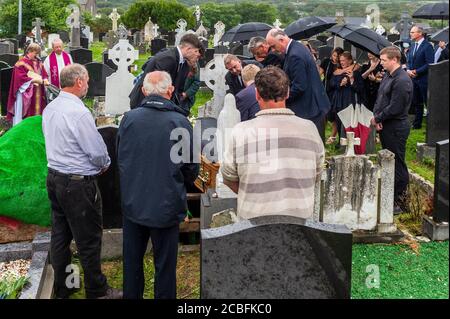 Goleen, West Cork, Ireland. 13th Aug, 2020. Ex Fine Gael TD Paddy Sheehan's  funeral took place at Church of our Lady, Star of the Sea and St. Patrick's in Goleen, West Cork today.   Paddy Sheehan is carried to his final resting place. Credit: AG News/Alamy Live News Stock Photo