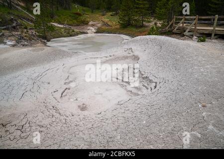 Close up view of the mud pots at Artists Paint Pots hiking trail area in Yellowstone National Park Stock Photo