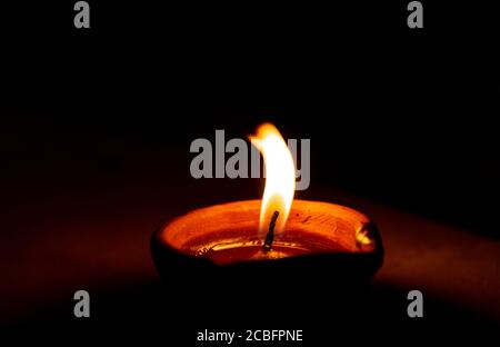 Diya (Candle Light brightening in the festival of Diwali Stock Photo