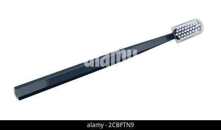 Black toothbrush with a plastic transparent lid isolated on a white background Stock Photo