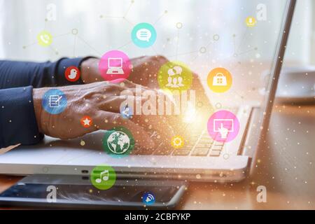 Lifestyle and technology concept  Close up man hands with laptop and social media web chart background. Man hands use computer network connect to soci Stock Photo