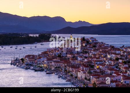 Evening view of Chora village of Poros island, Greece. Stock Photo