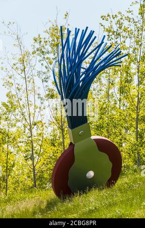 Large sculpture of wheel typewriter eraser with brush in Olympic Sculpture Park in Seattle, Washington.  Image taken in 2009. Stock Photo