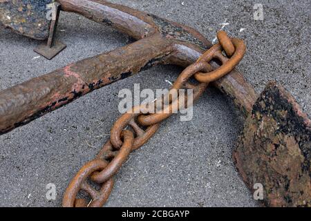 Old rusty admiralty ships anchor and chain Stock Photo