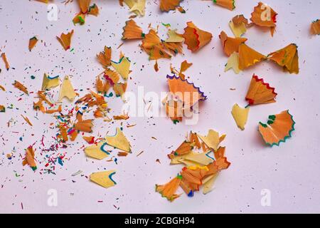 Color pencils shavings on white background Stock Photo