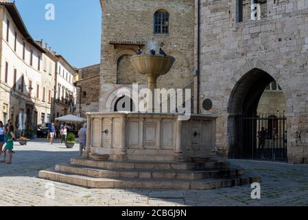 bevagna,italy august 13 2020:Fountain of the church of San Silvestro in the town of Bologna Stock Photo