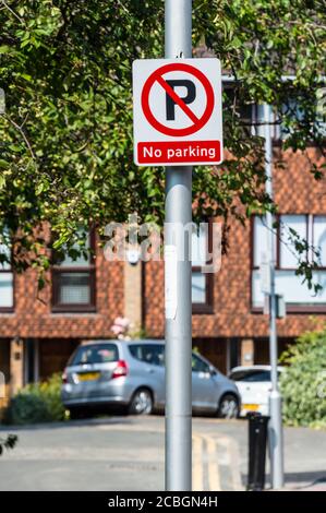 No parking sign on lamp post in private residential area Stock Photo